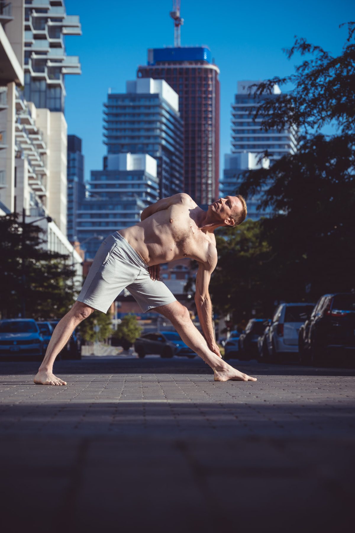 Christopher Gillett in revolved triangle on a downtown street